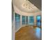 Cozy sunroom with hardwood floors, and large windows providing plenty of natural light at 4715 Scotney Ct, Suwanee, GA 30024