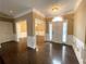 Welcoming foyer with hardwood floors, and bright entryway at 5005 Johns Creek Ct, Alpharetta, GA 30022