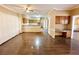 Inviting living room featuring hardwood floors and an open layout perfect for entertaining at 5005 Johns Creek Ct, Alpharetta, GA 30022