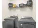 A laundry room with appliances, storage shelf, and labeled bins, combining functionality and organization at 8690 Cedar Creek Rdg, Riverdale, GA 30274