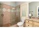 Bathroom featuring glass enclosed shower, tile flooring, and vanity with granite countertop at 9695 Almaviva Dr, Alpharetta, GA 30022