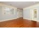 Open bedroom with hardwood floors, and views at 9695 Almaviva Dr, Alpharetta, GA 30022