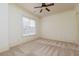 Bright bedroom featuring neutral carpet, recessed lighting, a ceiling fan, and lots of natural light at 9695 Almaviva Dr, Alpharetta, GA 30022