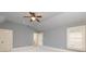 Bedroom featuring a ceiling fan and natural light from large windows at 9695 Almaviva Dr, Alpharetta, GA 30022