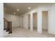 Spacious bonus room featuring neutral carpet, large closets, and beautiful millwork at 9695 Almaviva Dr, Alpharetta, GA 30022