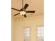 Bedroom ceiling fan with windows in the background at 9695 Almaviva Dr, Alpharetta, GA 30022