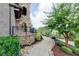 Beautifully landscaped walkway with stone accents and lush greenery leading to the home at 9695 Almaviva Dr, Alpharetta, GA 30022