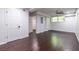 This bedroom features hardwood floors, a ceiling fan, and a bright window at 1393 Sagewood Cir, Stone Mountain, GA 30083