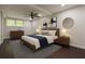 Bedroom featuring a queen-sized bed, modern furnishings, and a serene ambiance at 1393 Sagewood Cir, Stone Mountain, GA 30083