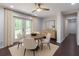 Dining room with a round table, four chairs, and access to the backyard at 1393 Sagewood Cir, Stone Mountain, GA 30083