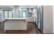 Bright kitchen with island, stainless steel appliances, and sleek countertops at 1393 Sagewood Cir, Stone Mountain, GA 30083