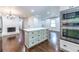 Open kitchen featuring a large island, stainless steel appliances, and hardwood floors at 1393 Sagewood Cir, Stone Mountain, GA 30083