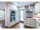 Modern kitchen boasting stainless appliances, gas cooktop and ample storage at 1393 Sagewood Cir, Stone Mountain, GA 30083