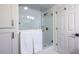 Elegant glass shower with tiled walls and modern fixtures, offering a spa-like experience at 1393 Sagewood Cir, Stone Mountain, GA 30083