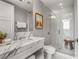 Bathroom featuring a glass enclosed shower, marble countertop and plenty of space at 1820 Peachtree Nw St # 804, Atlanta, GA 30309