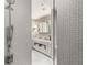 Clean bathroom featuring walk-in shower and double vanity with marble countertop at 1820 Peachtree Nw St # 804, Atlanta, GA 30309