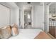 Bedroom featuring a space-saving murphy bed and an ensuite bathroom at 1820 Peachtree Nw St # 804, Atlanta, GA 30309