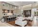 Elegant clubhouse featuring a modern kitchen, stylish seating, and a sophisticated wine display at 1820 Peachtree Nw St # 804, Atlanta, GA 30309