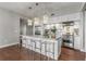 Bright kitchen with custom cabinetry, stainless steel appliances, a kitchen island, and ample counter space at 1820 Peachtree Nw St # 804, Atlanta, GA 30309