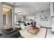 Open-concept living space with balcony access, seamlessly connecting the living room, kitchen, and dining areas at 1820 Peachtree Nw St # 804, Atlanta, GA 30309