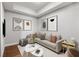 Comfortable living room with contemporary decor, large sectional, and modern artwork at 1820 Peachtree Nw St # 804, Atlanta, GA 30309