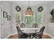 Cozy breakfast nook with bay window and views of the backyard at 2045 Barrett Downs Dr, Cumming, GA 30040