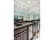 Well-equipped bar area with sleek countertops, mirrored backsplash, and ample storage at 2769 Peachtree Ne Rd # 7, Atlanta, GA 30305