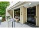 Close up of welcoming entrance with a bench and attractive front door at 2769 Peachtree Ne Rd # 7, Atlanta, GA 30305