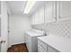 Functional laundry room with white appliances and ample storage space at 2769 Peachtree Ne Rd # 7, Atlanta, GA 30305