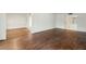 Open-concept living room with hardwood floors and seamless transition to other spaces at 2769 Peachtree Ne Rd # 7, Atlanta, GA 30305