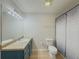 Standard bathroom offers functionality with ample lighting and a shower-tub combination at 907 Olde Mill Ln, Norcross, GA 30093