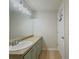 Bathroom featuring a large mirror and extended vanity at 907 Olde Mill Ln, Norcross, GA 30093