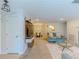 Open-concept living space featuring a modern media center, fireplace and dining area at 907 Olde Mill Ln, Norcross, GA 30093