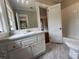 Bright bathroom featuring marble floors, subway tile, and a stylish vanity at 1098 Oakdale Ne Rd, Atlanta, GA 30307