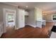 Open kitchen with custom white cabinetry, marble countertop desk and adjacent dining area at 1098 Oakdale Ne Rd, Atlanta, GA 30307