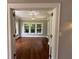 Living room with hardwood floors, neutral paint, windows overlooking mature trees and natural light at 1098 Oakdale Ne Rd, Atlanta, GA 30307