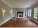 Bright living room with hardwood floors, fireplace, and French doors for a classic, inviting space at 1098 Oakdale Ne Rd, Atlanta, GA 30307
