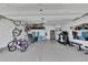 Spacious garage featuring ample storage, work out area, and room for multiple bicycles at 280 Woods Creek Drive, Suwanee, GA 30024