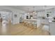 Bright kitchen with stainless steel appliances, large island with seating and lots of storage at 280 Woods Creek Drive, Suwanee, GA 30024