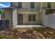 Backyard featuring a patio and grass area with a wood privacy fence at 3073 Waldrop Cir, Decatur, GA 30034