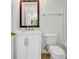 Bathroom featuring a white vanity with modern sink and brushed gold faucet plus toilet and tub shower at 3073 Waldrop Cir, Decatur, GA 30034