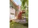 A multi-level deck/patio is accessed by a wooden staircase in the backyard of this home at 5581 Fox Glove Ct, Douglasville, GA 30135