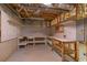 Unfinished basement workshop with pegboard, and built-in tables at 5581 Fox Glove Ct, Douglasville, GA 30135