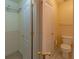 Bathroom showcasing a toilet, storage closet and towel bar adjacent to the walk-in closet at 5581 Fox Glove Ct, Douglasville, GA 30135