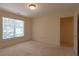 Bedroom featuring natural light from window and access to a walk in closet at 5581 Fox Glove Ct, Douglasville, GA 30135