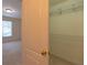 Spacious walk-in closet with convenient shelving, providing ample storage in the bedroom at 5581 Fox Glove Ct, Douglasville, GA 30135