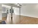 Inviting living room with hardwood floors and views of the kitchen at 5312 Brooklands Dr, Lithonia, GA 30058