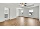 A spacious primary bedroom offers a ceiling fan and en-suite bathroom at 5312 Brooklands Dr, Lithonia, GA 30058