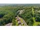 Scenic aerial view of a neighborhood, highlighting the community's green landscape and proximity to nature at 2015 Chapel Estates Lane Southeast Ln, Dacula, GA 30019