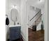 Elegant powder room with stylish vanity and modern fixtures at 2015 Chapel Estates Lane Southeast Ln, Dacula, GA 30019